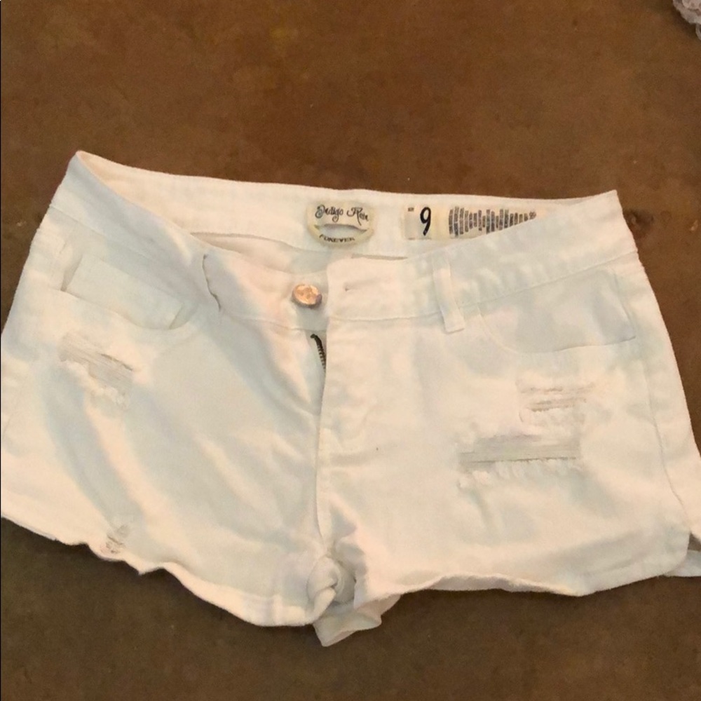 White distressed jean shorts size 9